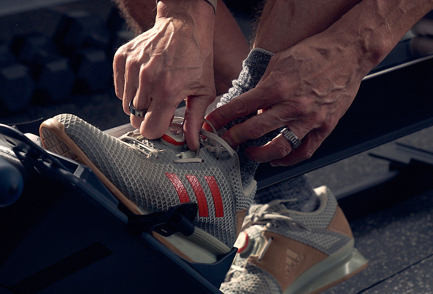 weightlifting shoes for indoor rowing provide a solid and stable platform with a raised heel